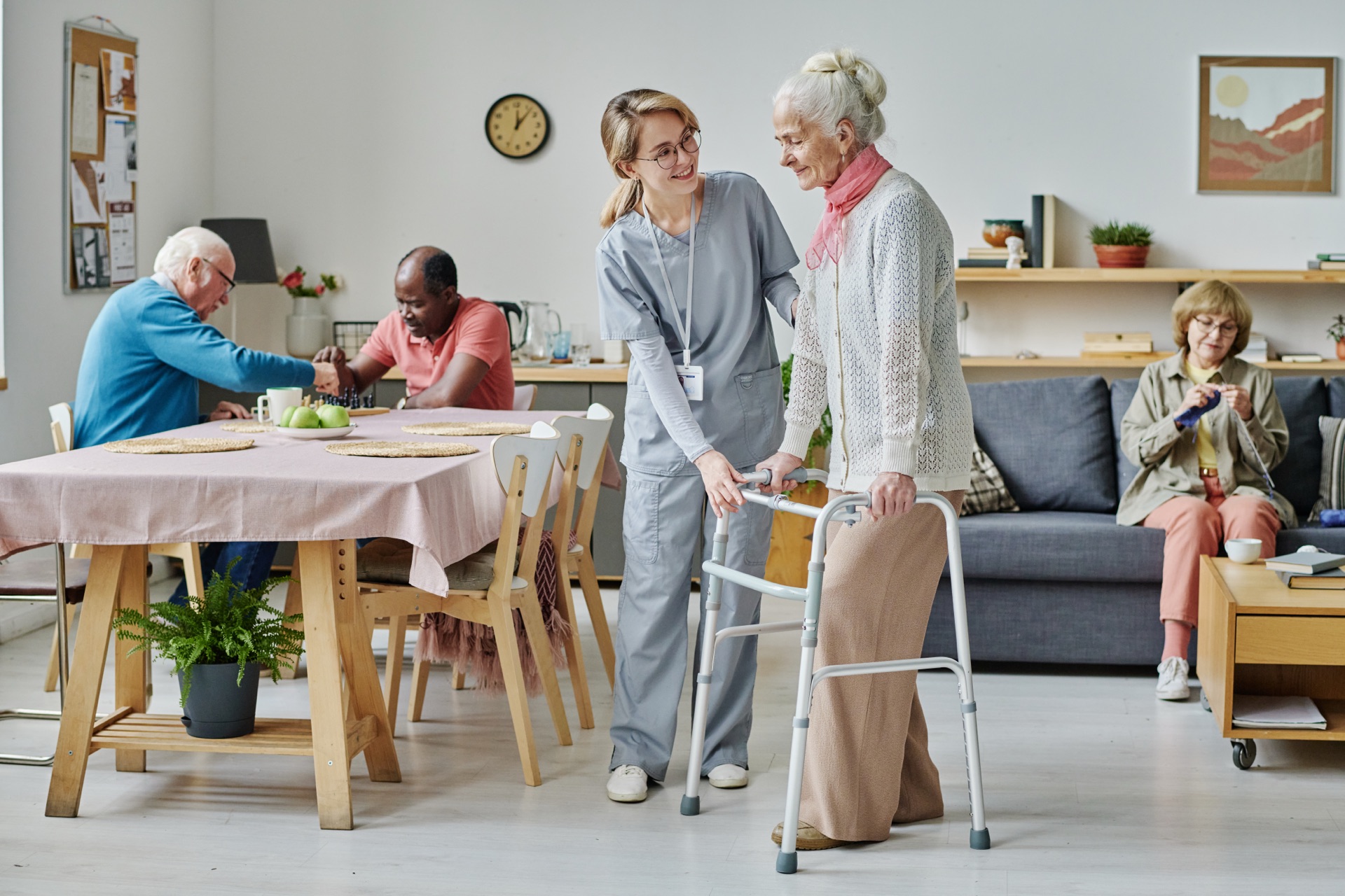 Caregiver providing skilled nursing care in a facility